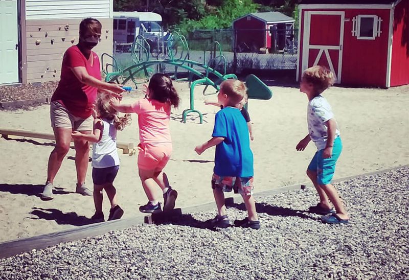 Children catching bubbles at The Wolfeboro Area Children's Center in Wolfeboro, NH. (Courtesy photo.)